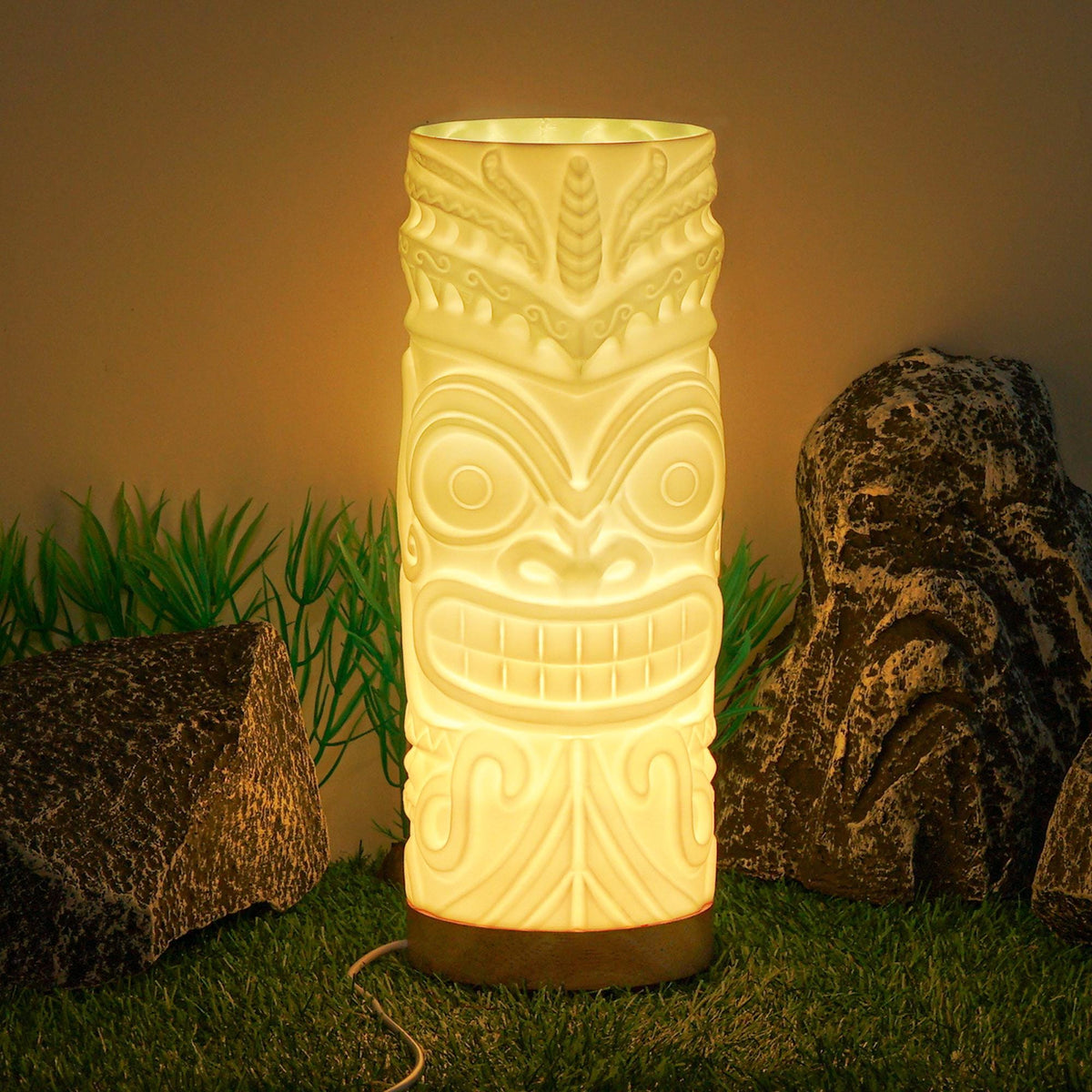 Smile tiki lamp glowing warm on a tropical scene